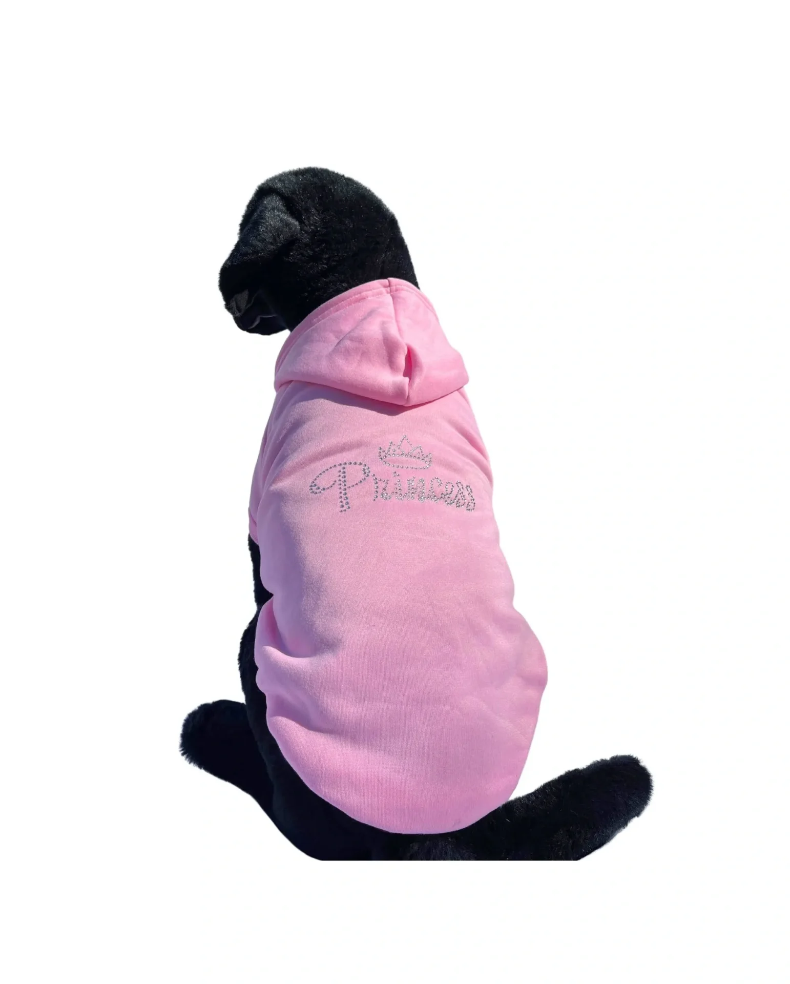 A black dog sits against a white backdrop wearing the Handmade Bling Pet Dog Hoodie Sweatshirt in pink, featuring "Princess" and a crown graphic on the back.